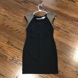 Black dress with gold studded shoulders